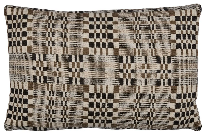 Brimfield Woven Pillow Cover in Cinder styled with cording in a living room