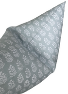 Chloe spa blue pillow cover styled in a room