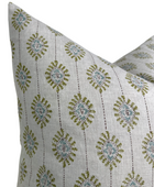 Bombay moss green pillow cover styled in a room