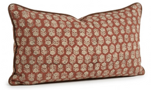 Tulsi Floral Pillow Cover in Saffron styled on a sofa