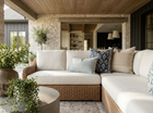 Wave Length Outdoor Pillow Cover in Sky Blue styled on outdoor seating