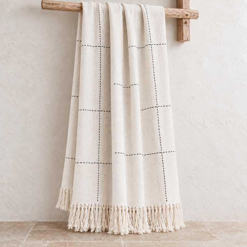 Kiara natural handwoven cotton throw with black stitching