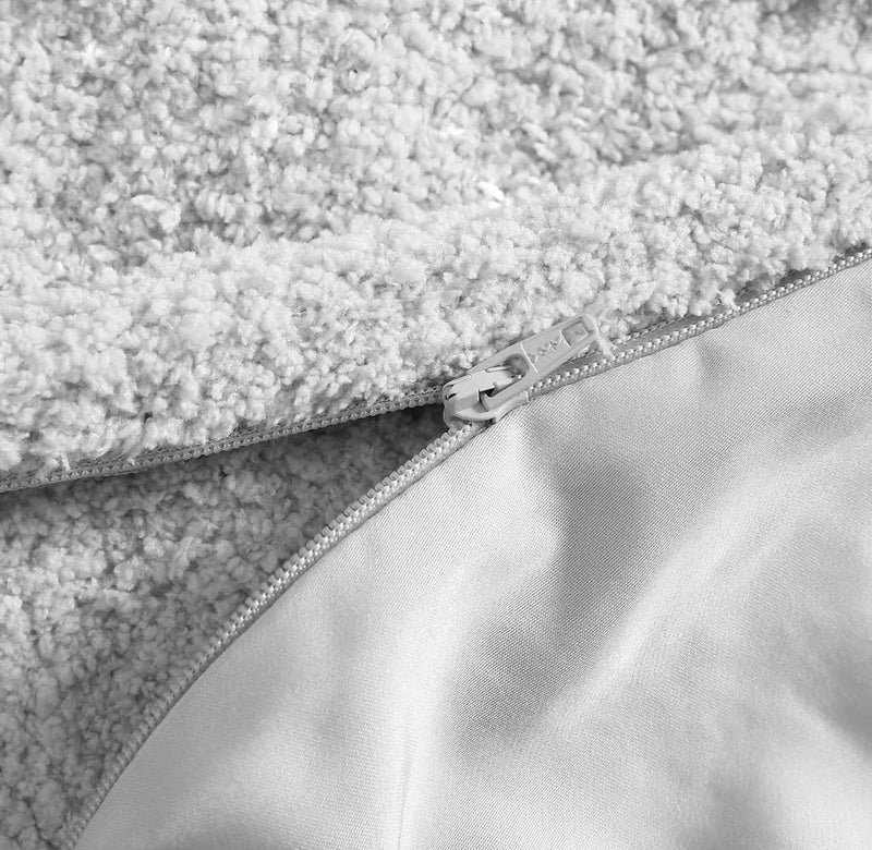 Dual-sided duvet cover showing fluffy Snug fabric and smooth bamboo side