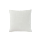 Snug Euro Sham styled on bed with layered pillows