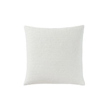 Snug Euro Sham styled on bed with layered pillows