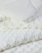 Close-up of waffle texture on plush Snug comforter