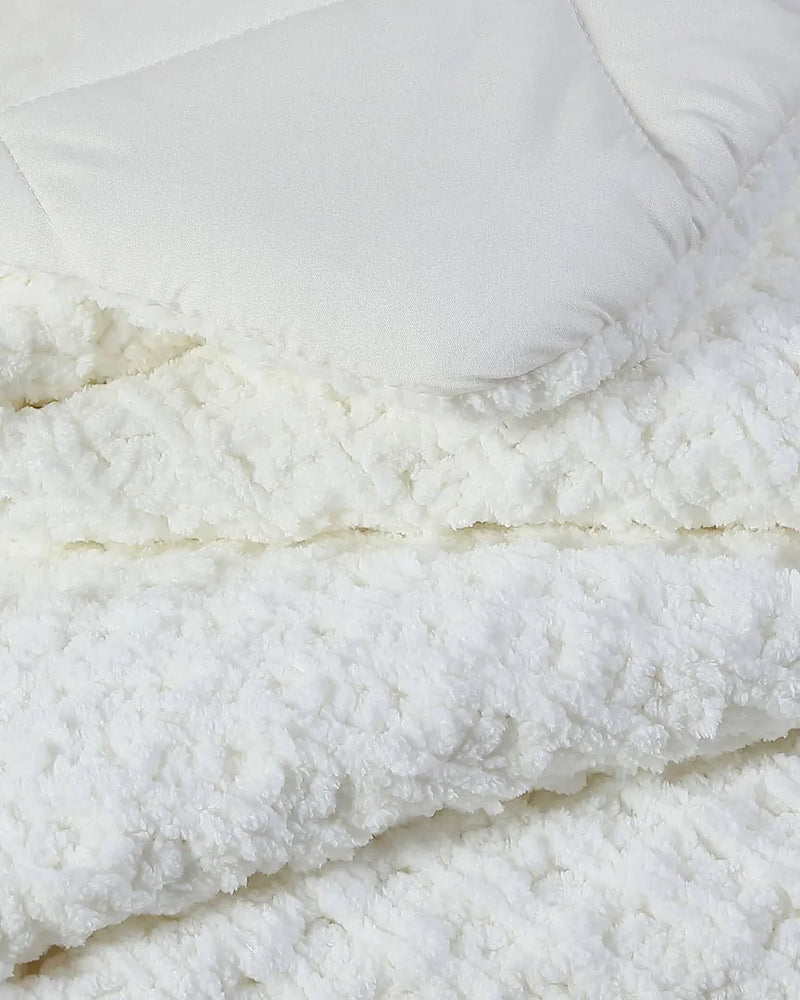 Close-up of waffle texture on plush Snug comforter