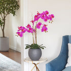 Lifelike Artificial orchid plant with soft pink blooms