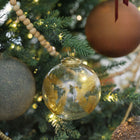 Artisan clear Christmas ornaments with gold hand-painted details
