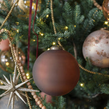 Rustic frosted glass ornaments with antique toppers