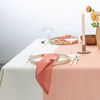 Stripe Collection persimmon tablecloth paired with matching napkins