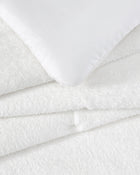 Close-up of stitch detailing on Cloud Silque Comforter fabric