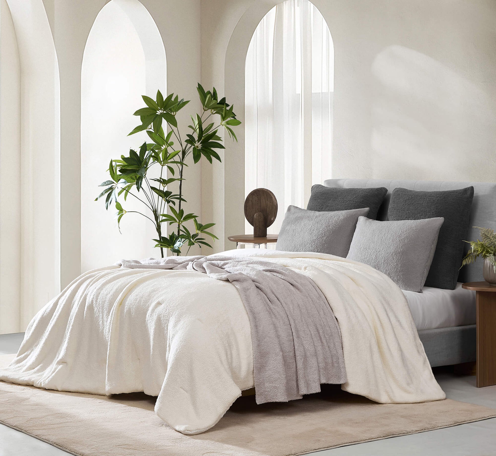 Luxurious Cloud Silque Stitch Comforter folded neatly at end of bed