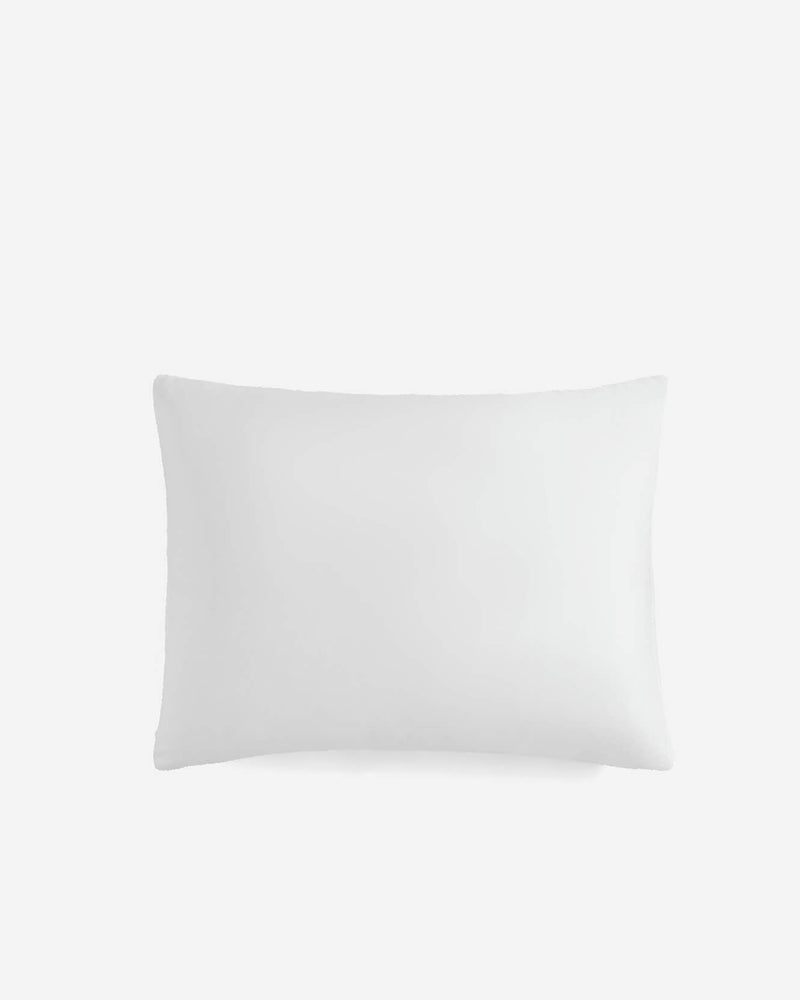 Close-up of double-sided sham fabric with plush and silky finishes