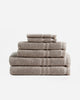 Soft fringed Turkish cotton towels in neutral tones for bathroom decor