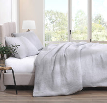 Luxury bamboo and Snug fabric duvet cover styled on queen bed