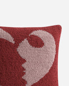 Artistic throw pillow with bold face design