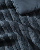 Close-up of piped trim on Snug Piped Comforter