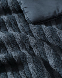 Close-up of piped trim on Snug Piped Comforter