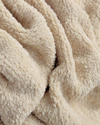 Lightweight 60x48 Snug Lap Throw blanket on sofa