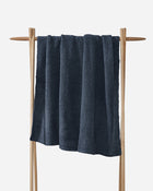 Lightweight Snug Throw folded neatly with cozy texture