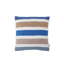 Burano Throw Pillow styled on sofa with spring accents