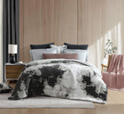 Modern multi-tone comforter in Ocean shades with recycled filling