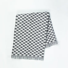 Quilted Sujani throw blanket in soft black and white, full view