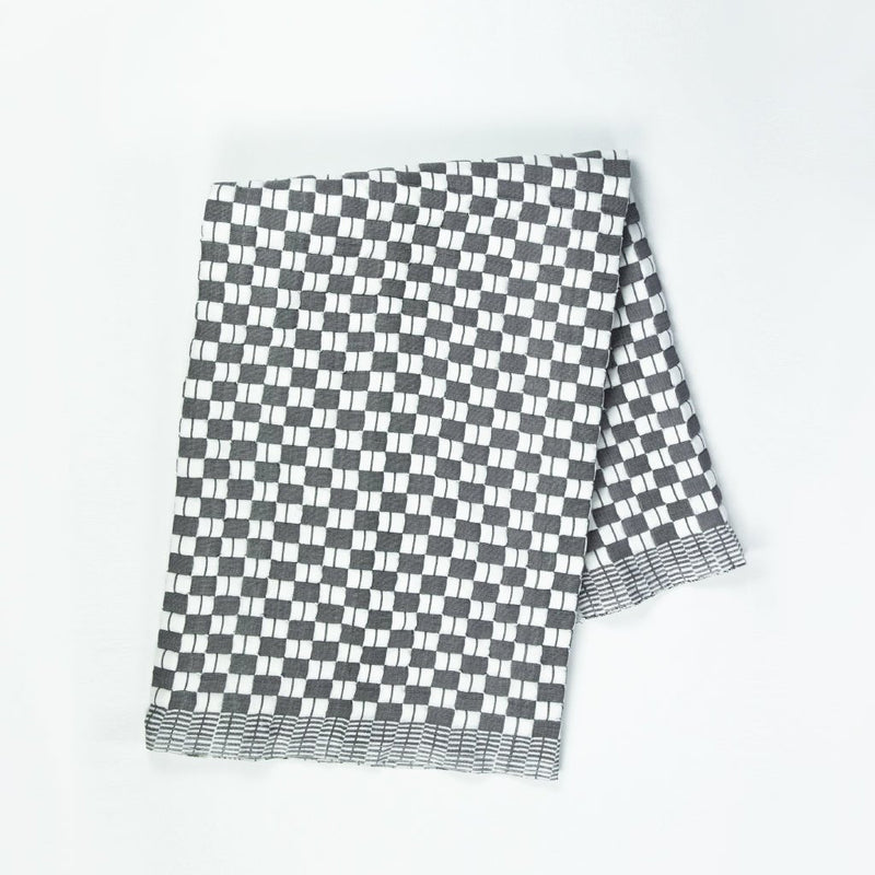 Quilted Sujani throw blanket in soft black and white, full view