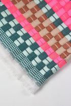 Close-up of the quilted Sujani throw blanket weave in multi green and pink