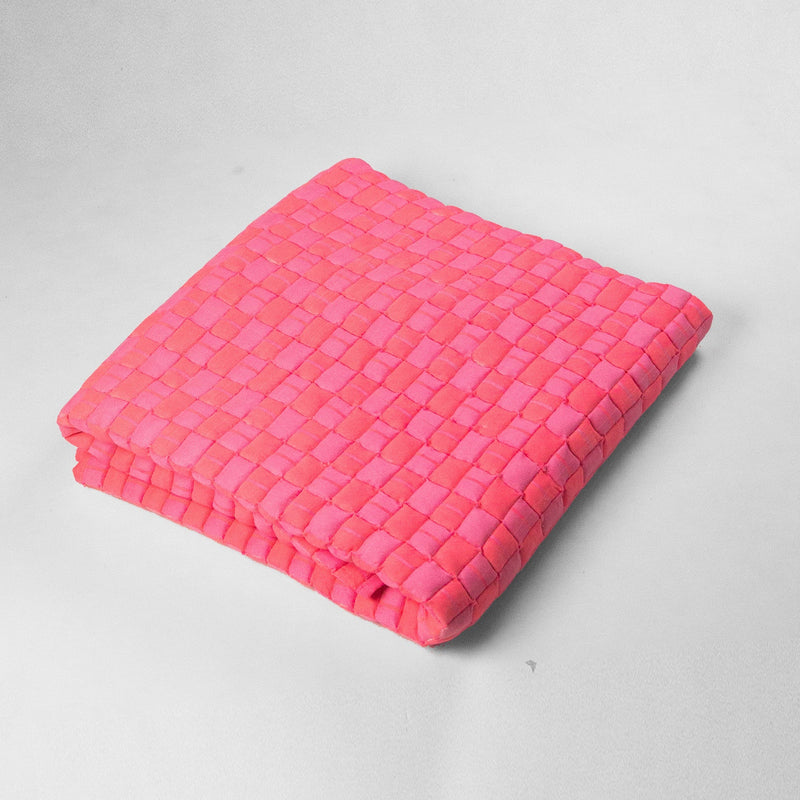 Quilted Sujani throw blanket in neon pink stripe