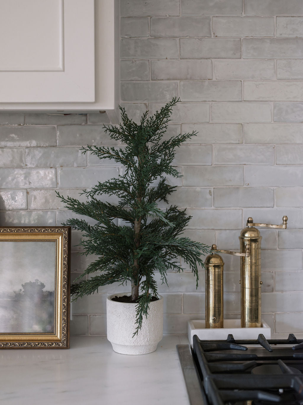 Lifelike cedar tree for entryway décor