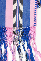 Close-up of the hand-dyed palm ikat pattern in blue and pink