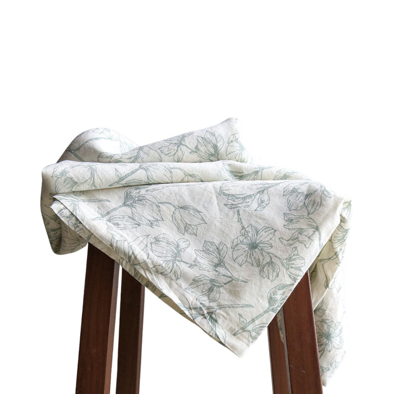 Grey linen tablecloth with green lily designs