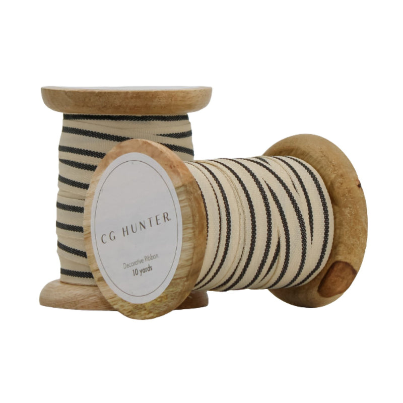 Cream and black grosgrain ribbon on handmade wooden spools