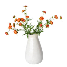 Artificial orange ranunculus flower for bright arrangements