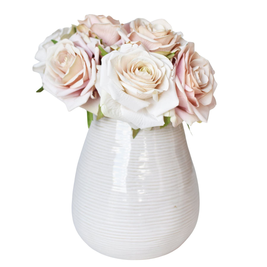 Artificial rose bouquet in soft pink and cream tones