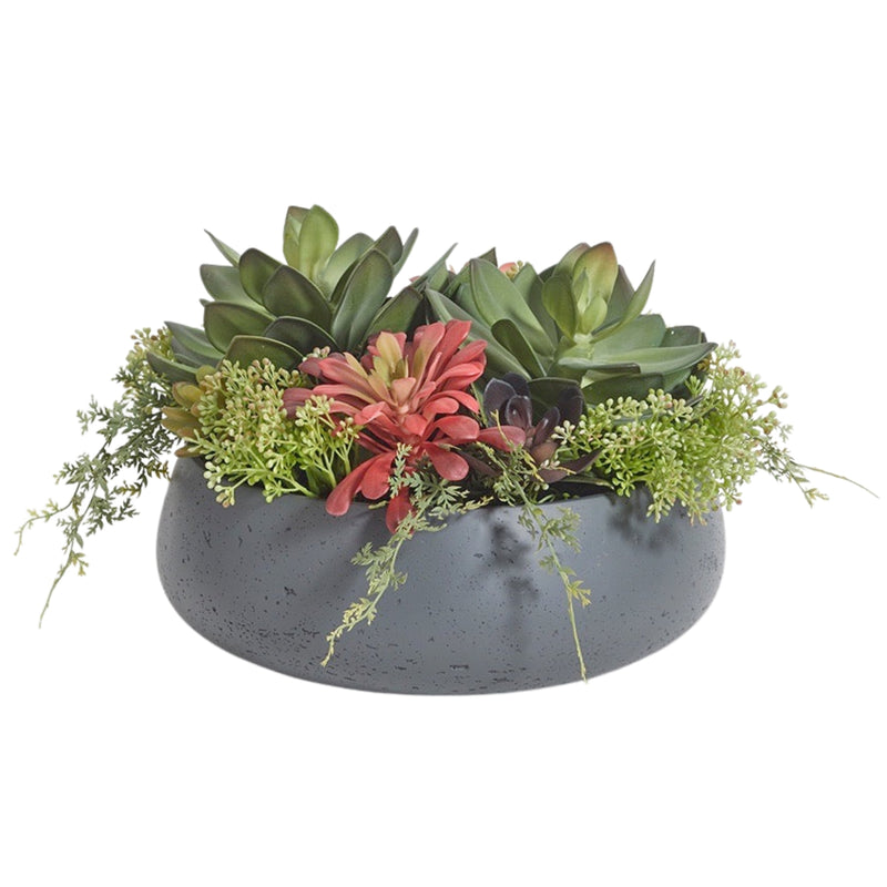 Round artificial succulent arrangement in gray planter
