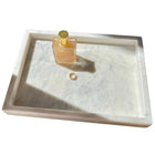Handcrafted white marble serving tray with organic stone design