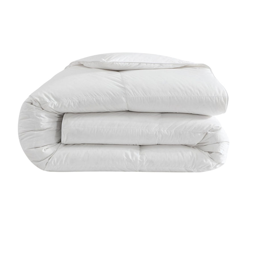 Luxurious down duvet insert with TENCEL shell on bed