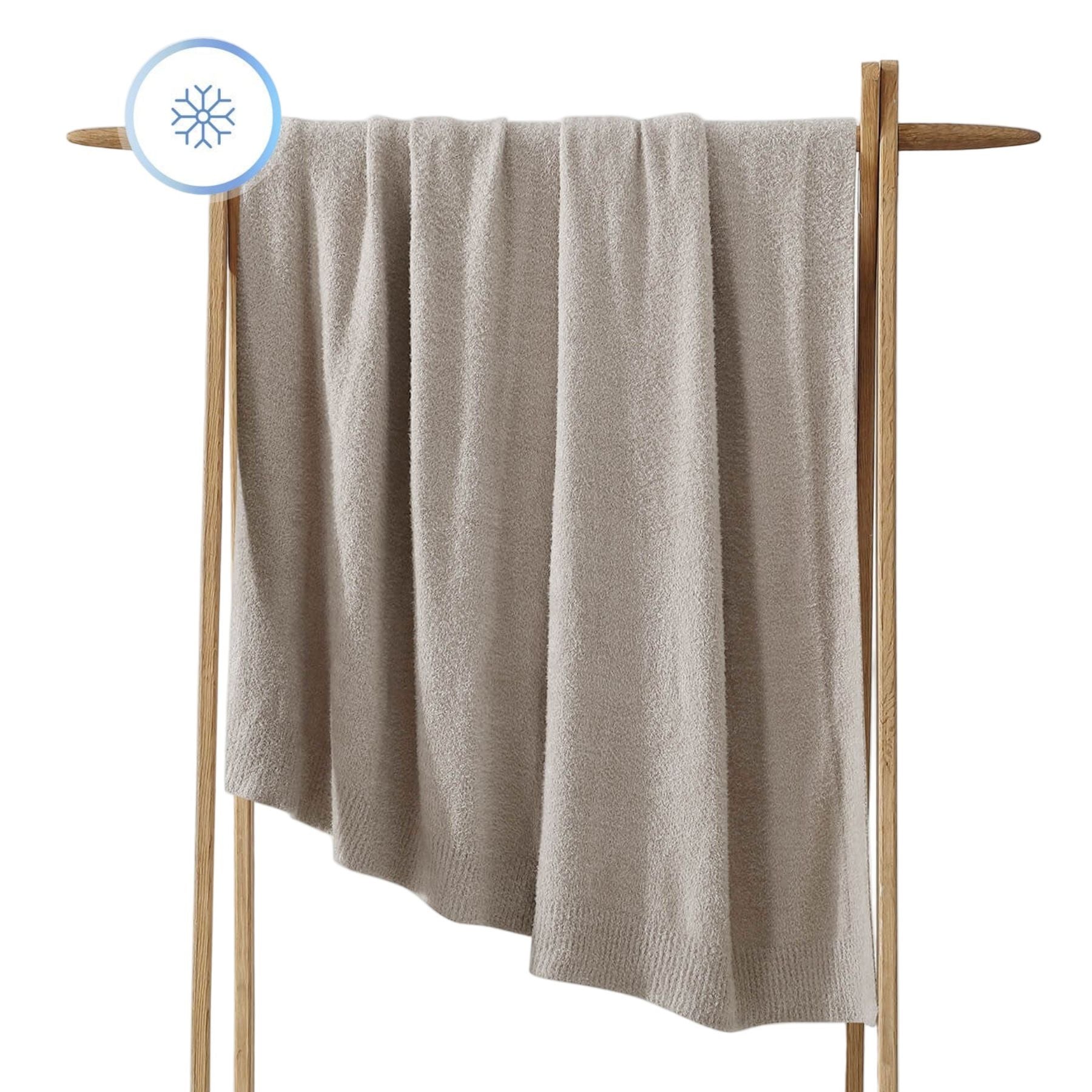 Oversized Cloud Cool Throw draped across a sofa