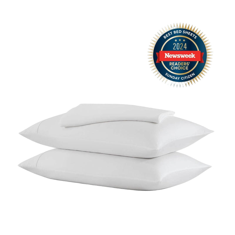 Silky lyocell sheet set folded neatly in neutral tones