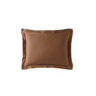 Natural bamboo sham set styled on bed in neutral tones