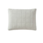 Stonewashed lyocell sham set in soft neutral tones on bed