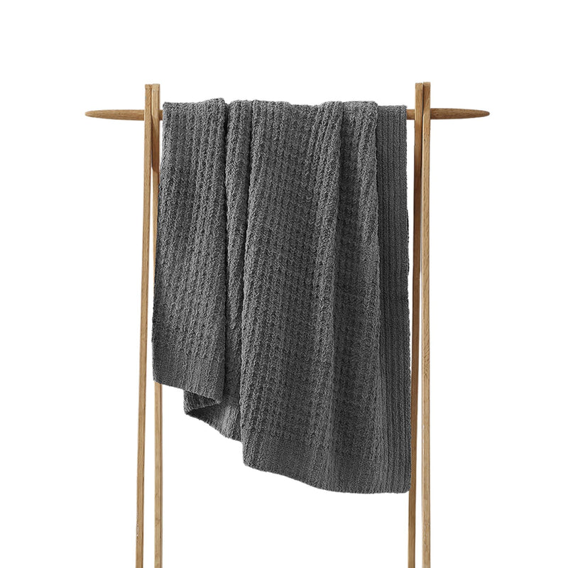 Waffle Lightweight Throw blanket folded on bed