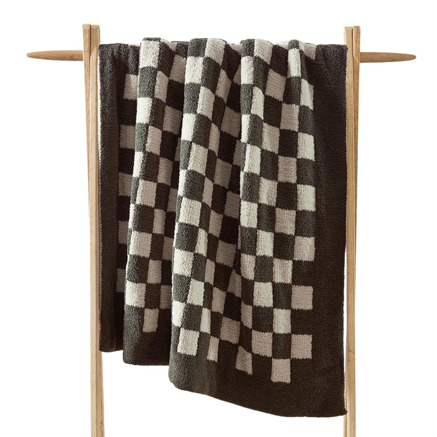 Checkerboard Snug Throw draped over sofa arm