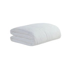 Snug Quilted Comforter neatly spread on modern bed