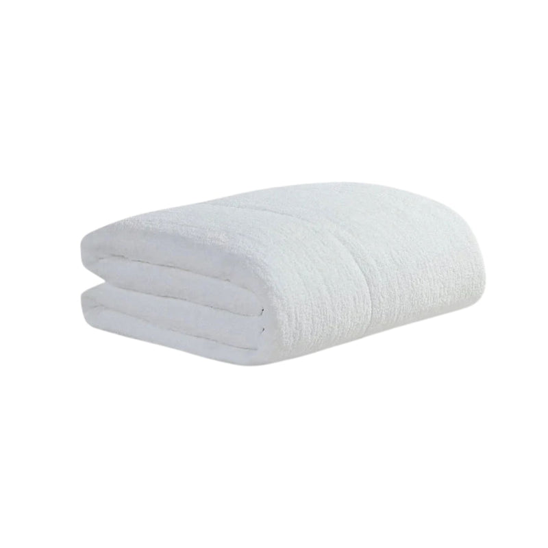 Snug Quilted Comforter neatly spread on modern bed