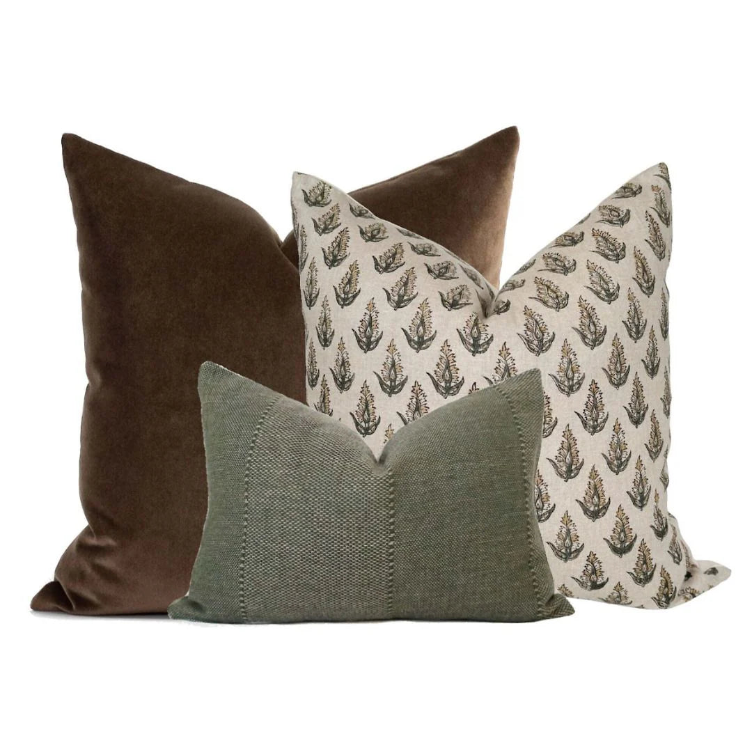 Truffle Velvet Pillow Cover styled on a neutral sofa in a designer living room