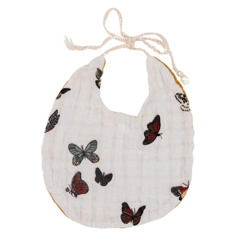 Butterfly print muslin bib with braided ties